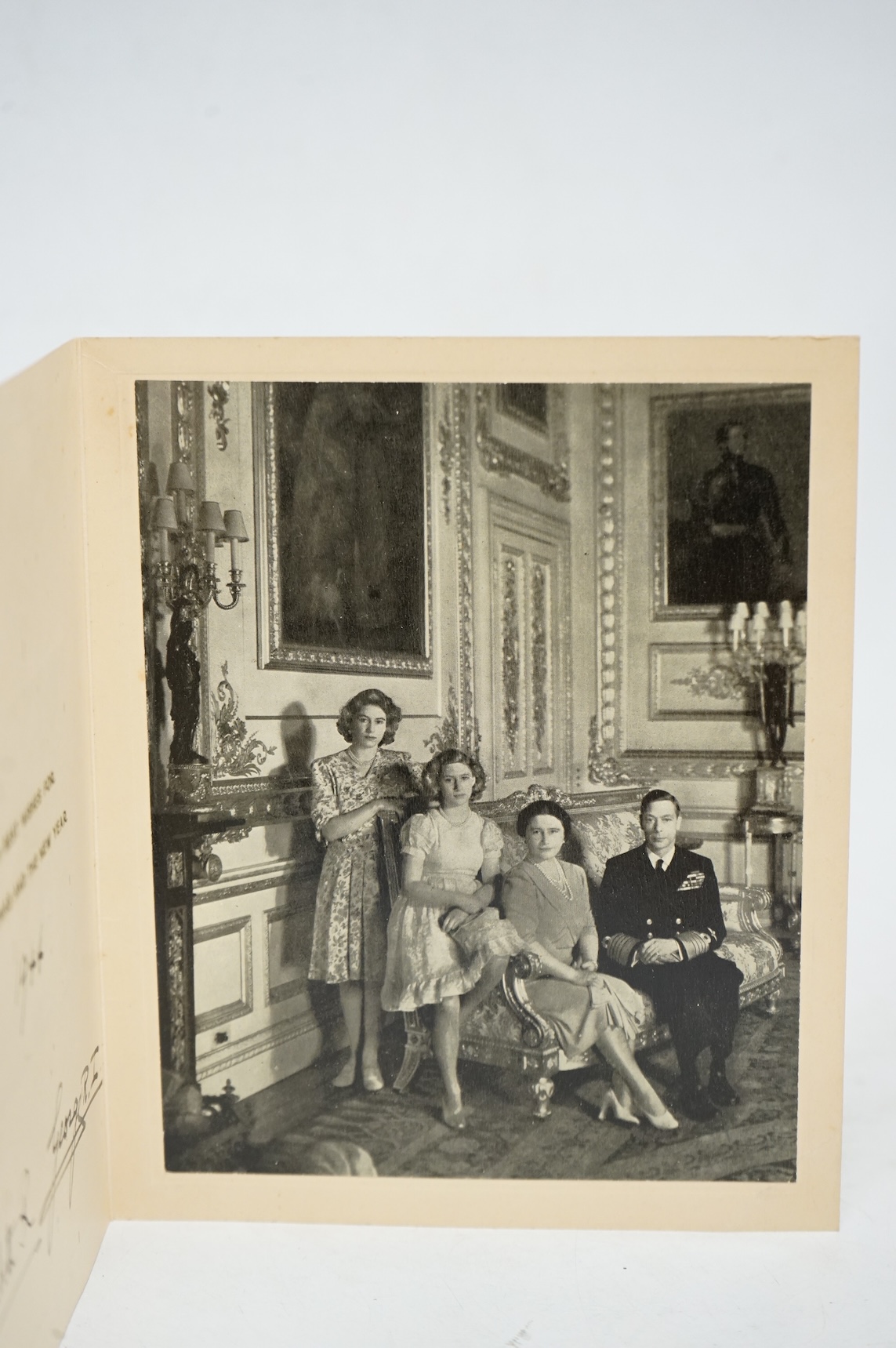 A Royal Christmas card from HM King George VI and Queen Elizabeth for 1944, published by Raphael Tuck and Sons Ltd. with a gilt embossed crown on the front, inside; ‘with best wishes for Christmas and the New Year 1944,